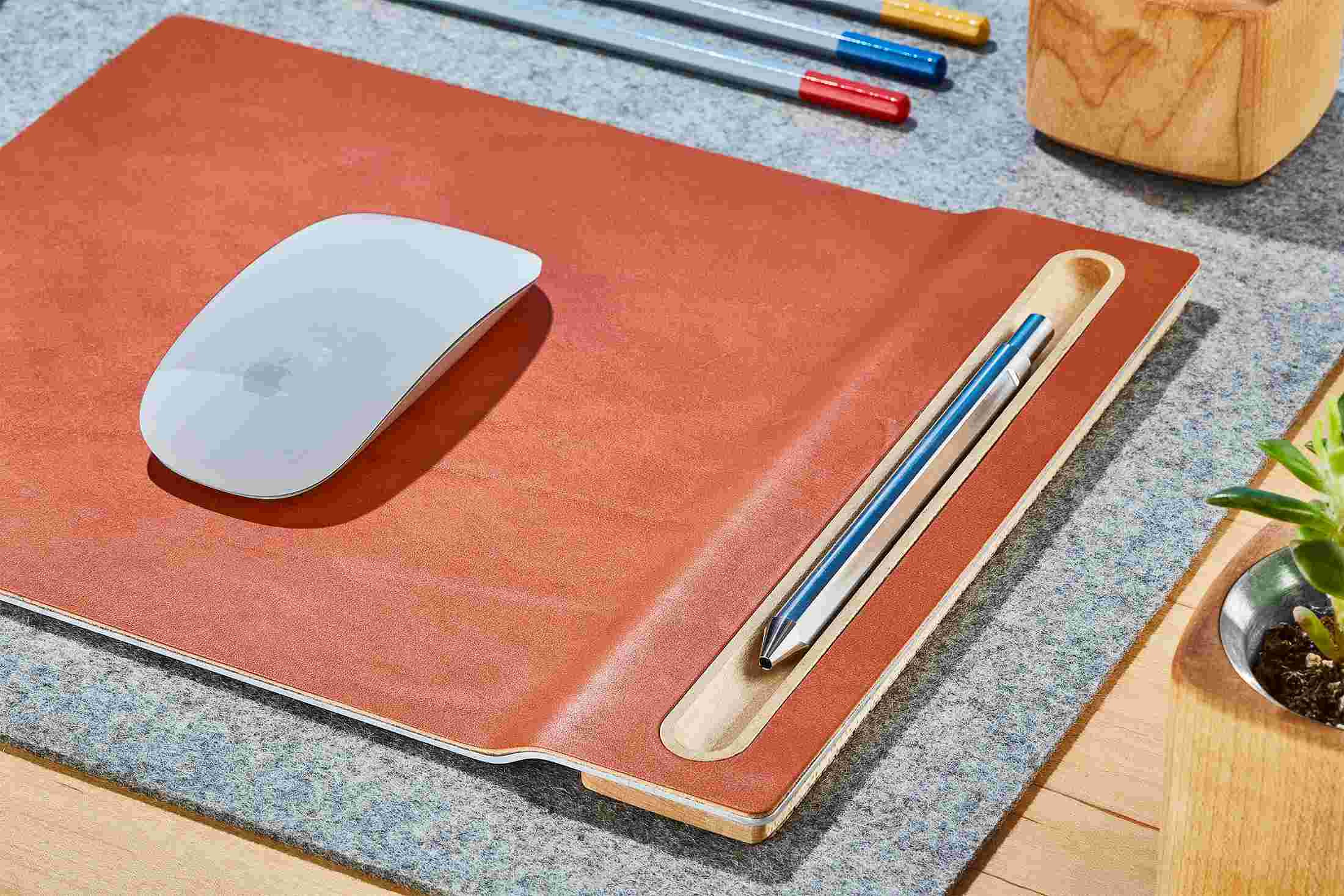 Detail of the maple wood pen tray integrated into the Grovemade leather mouse pad