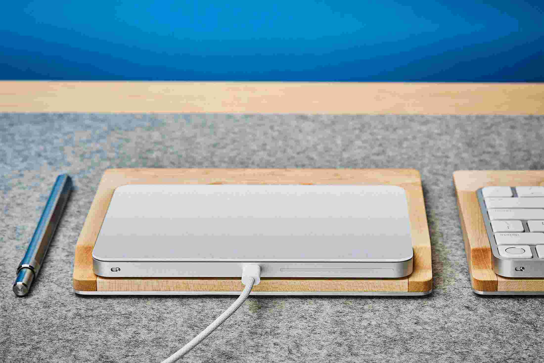 Rear view detail of the steel and maple wood trackpad tray.