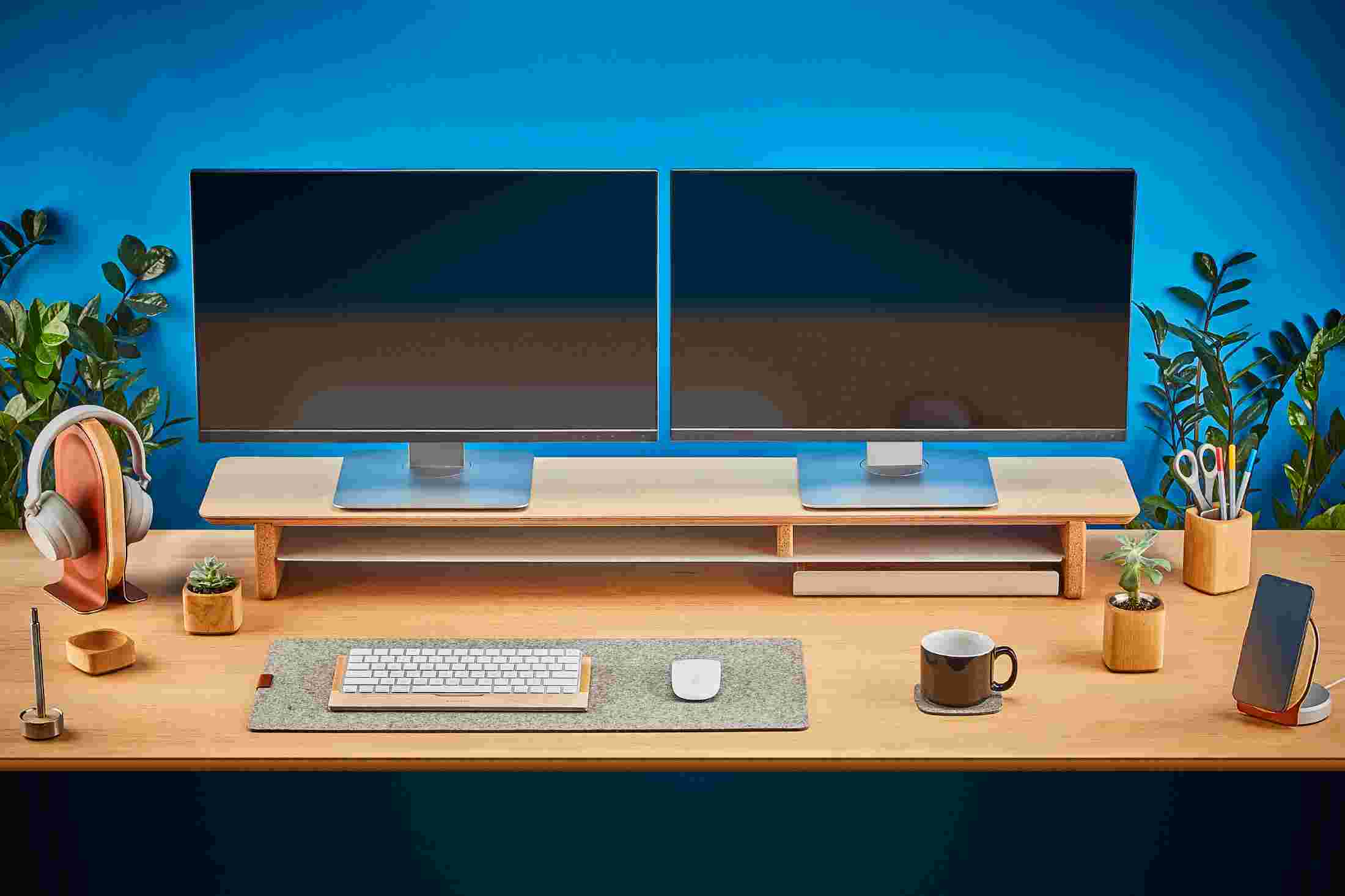 The small light wool felt desk pad slides easily under the desk shelf.