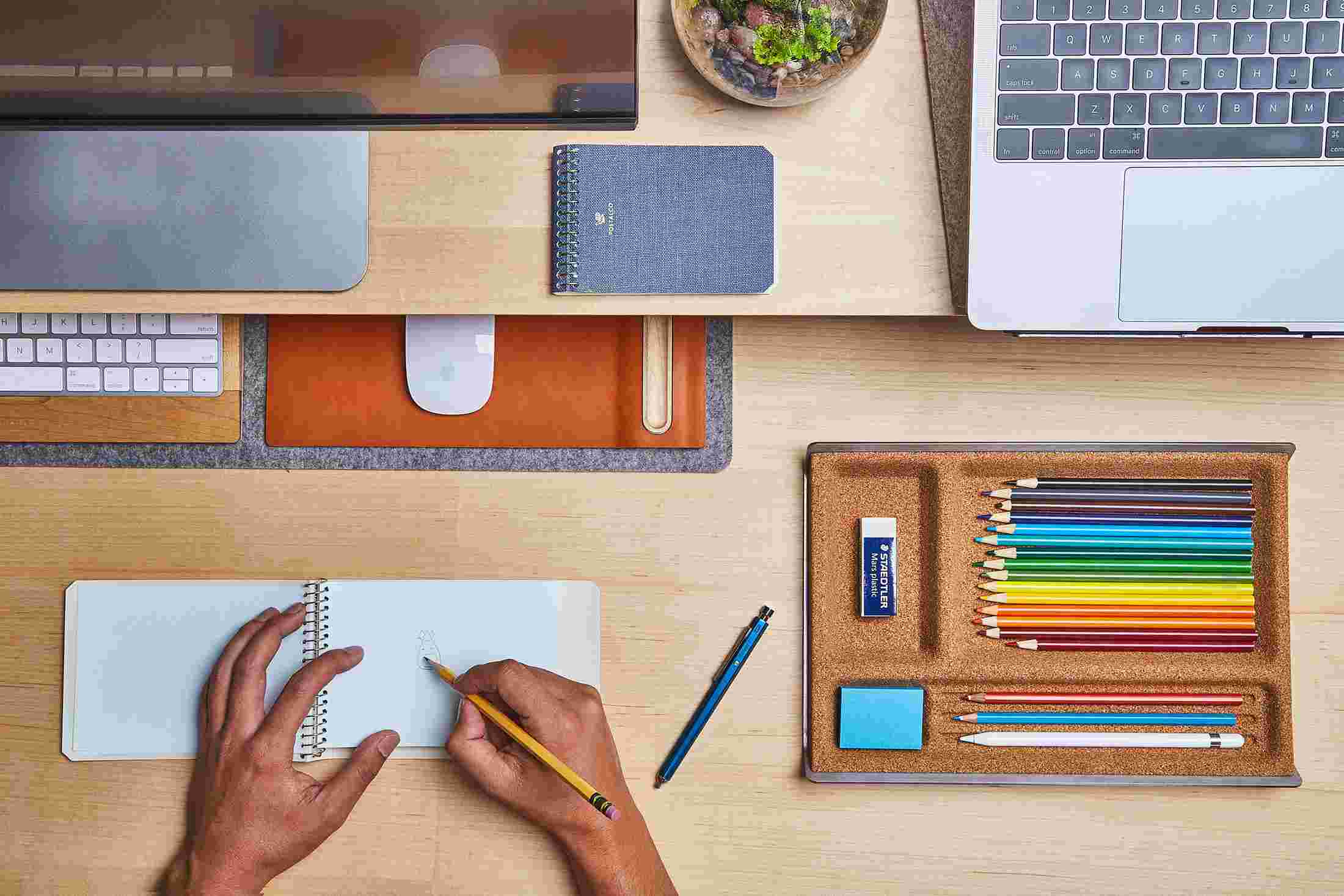The Small Desk Pad tucked under the Maple Desk Shelf, creating space to sketch and write.