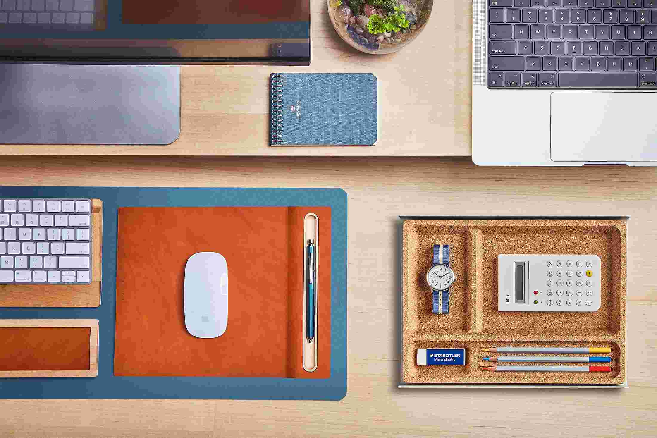 The Small Matte Desk Pad in Navy Blue, pulled out from the Maple Desk Shelf for use with a keyboard and mouse.