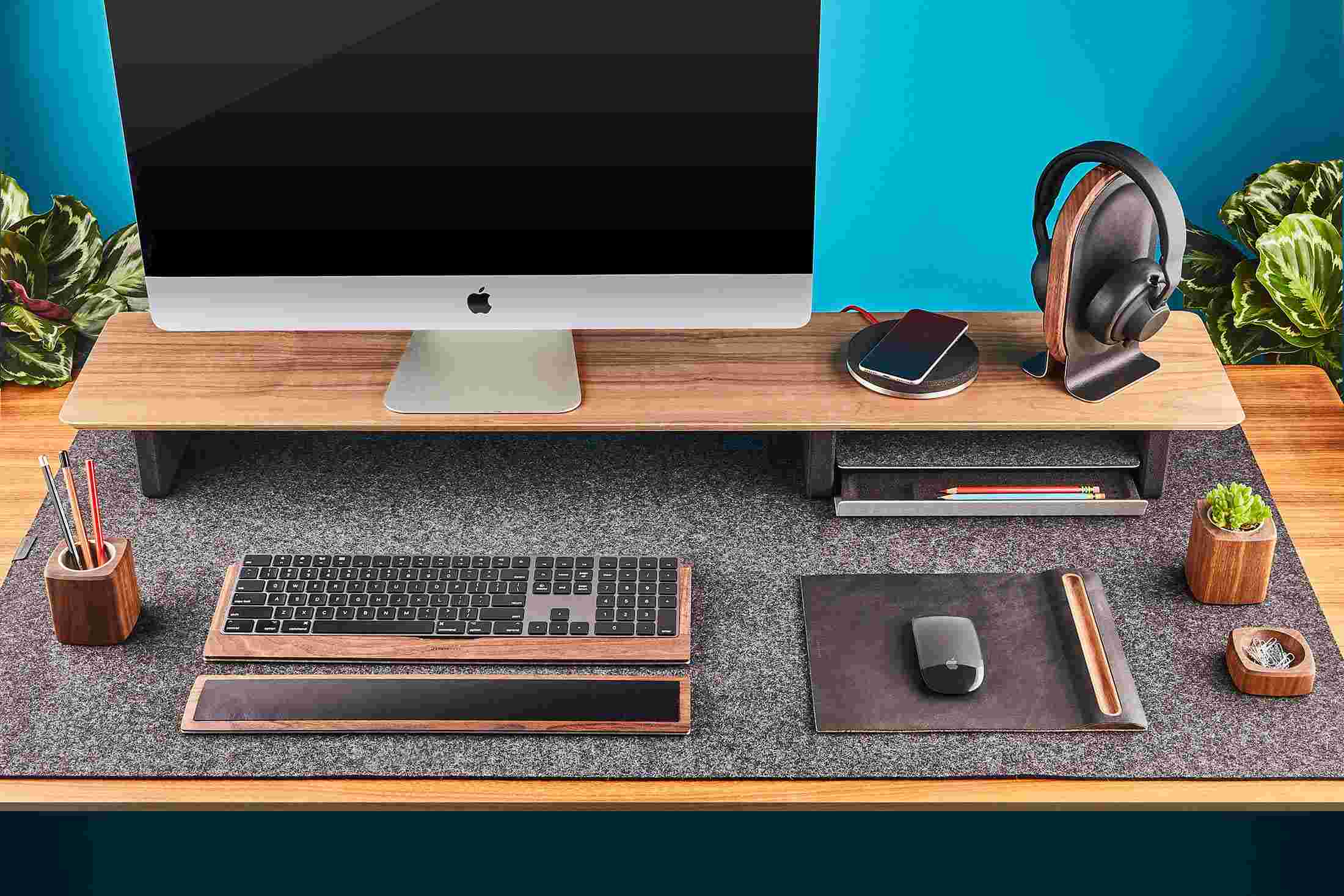 The Grovemade Walnut Wood Desk Shelf System with headphone stand and wireless iPhone charging pad.