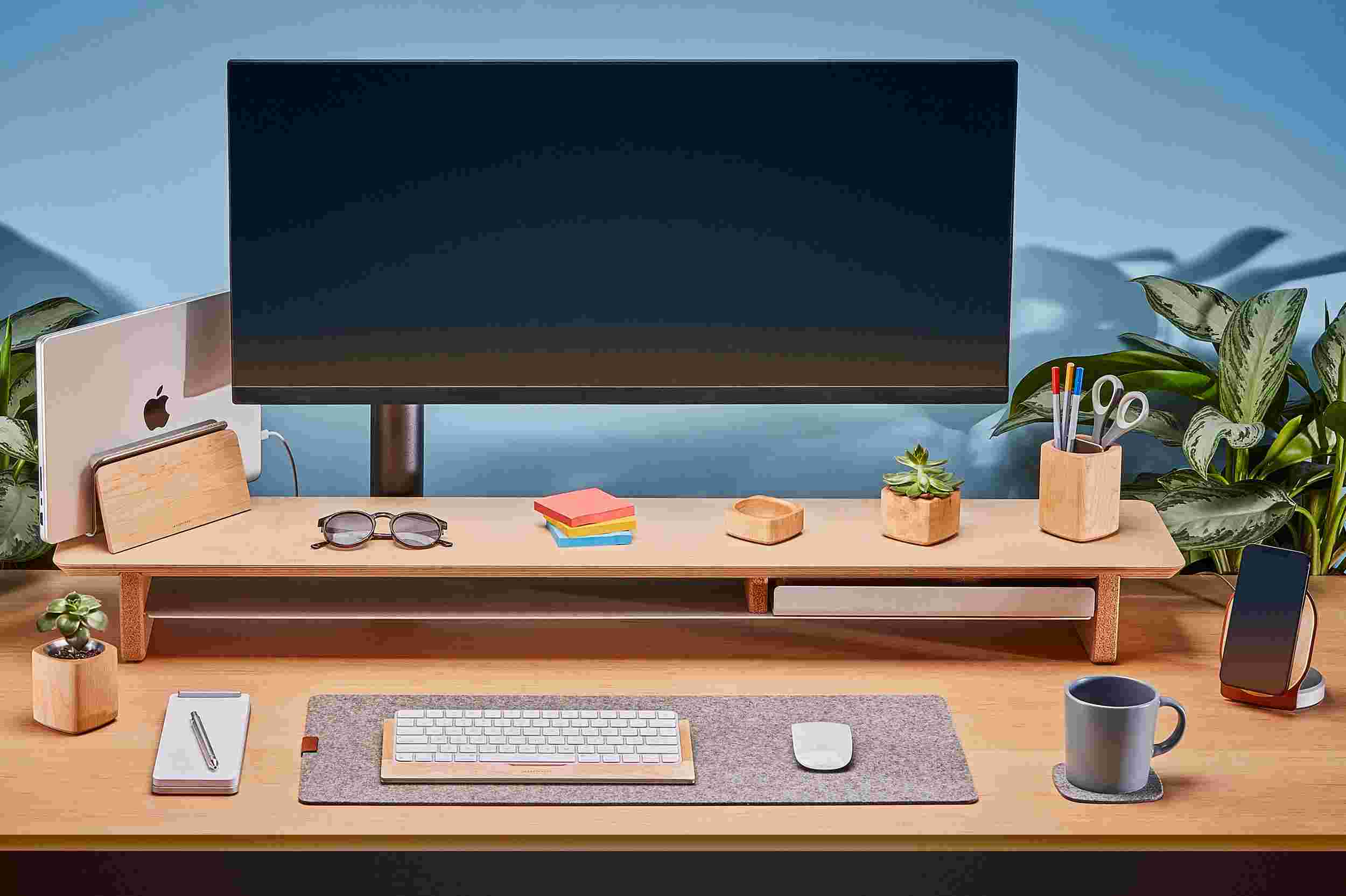 The Large Maple Desk Shelf in use with an ultra-wide monitor.