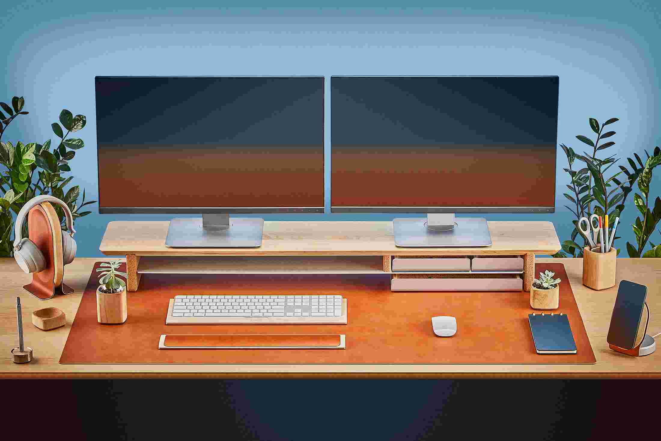 The Extra Large Felt Desk Pad covering almost an entire desktop, in use with the Solid Maple Desk Shelf System.