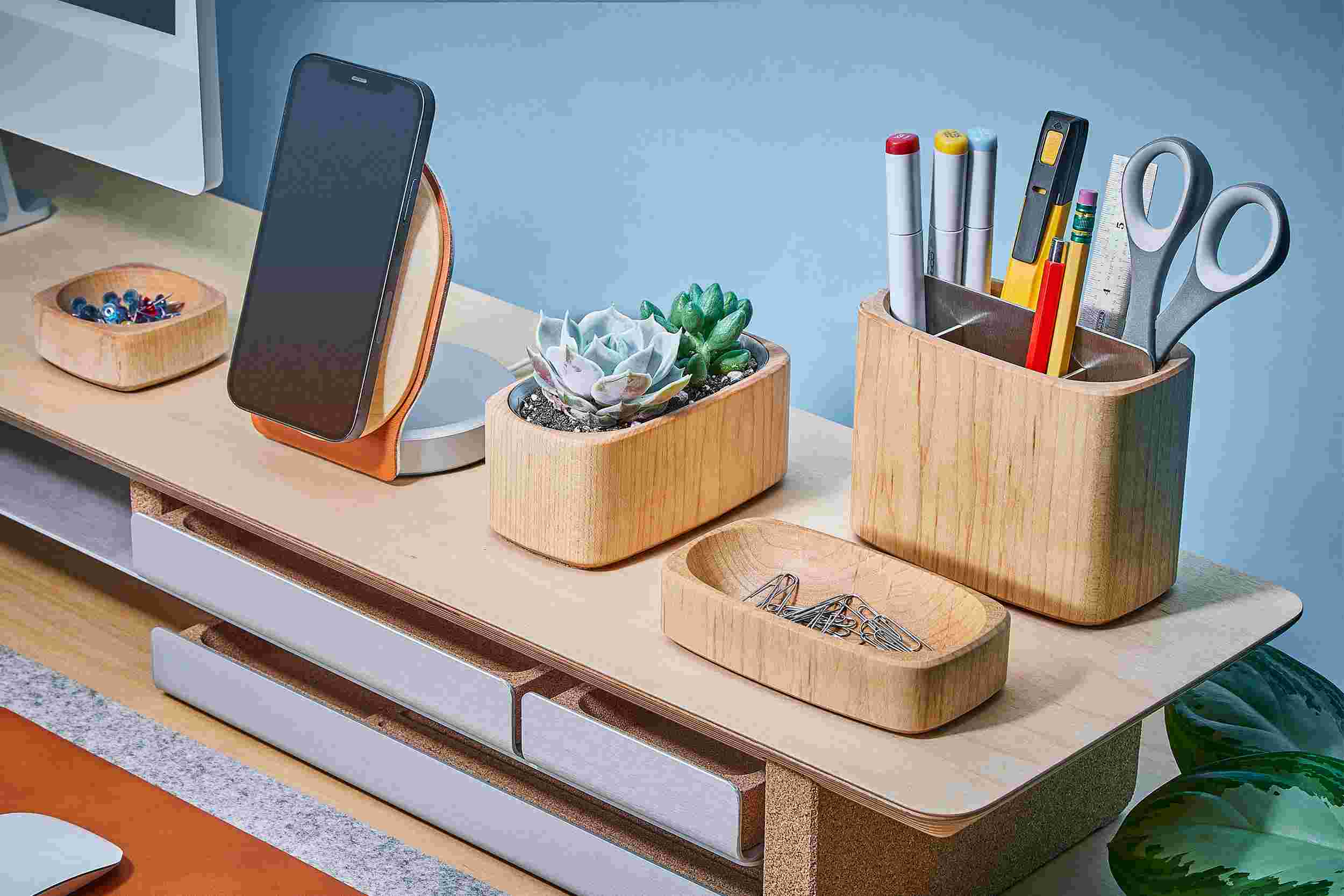 Full assortment of maple organizer trays, compartments, and dishes, with matching Walnut iPhone Dock.
