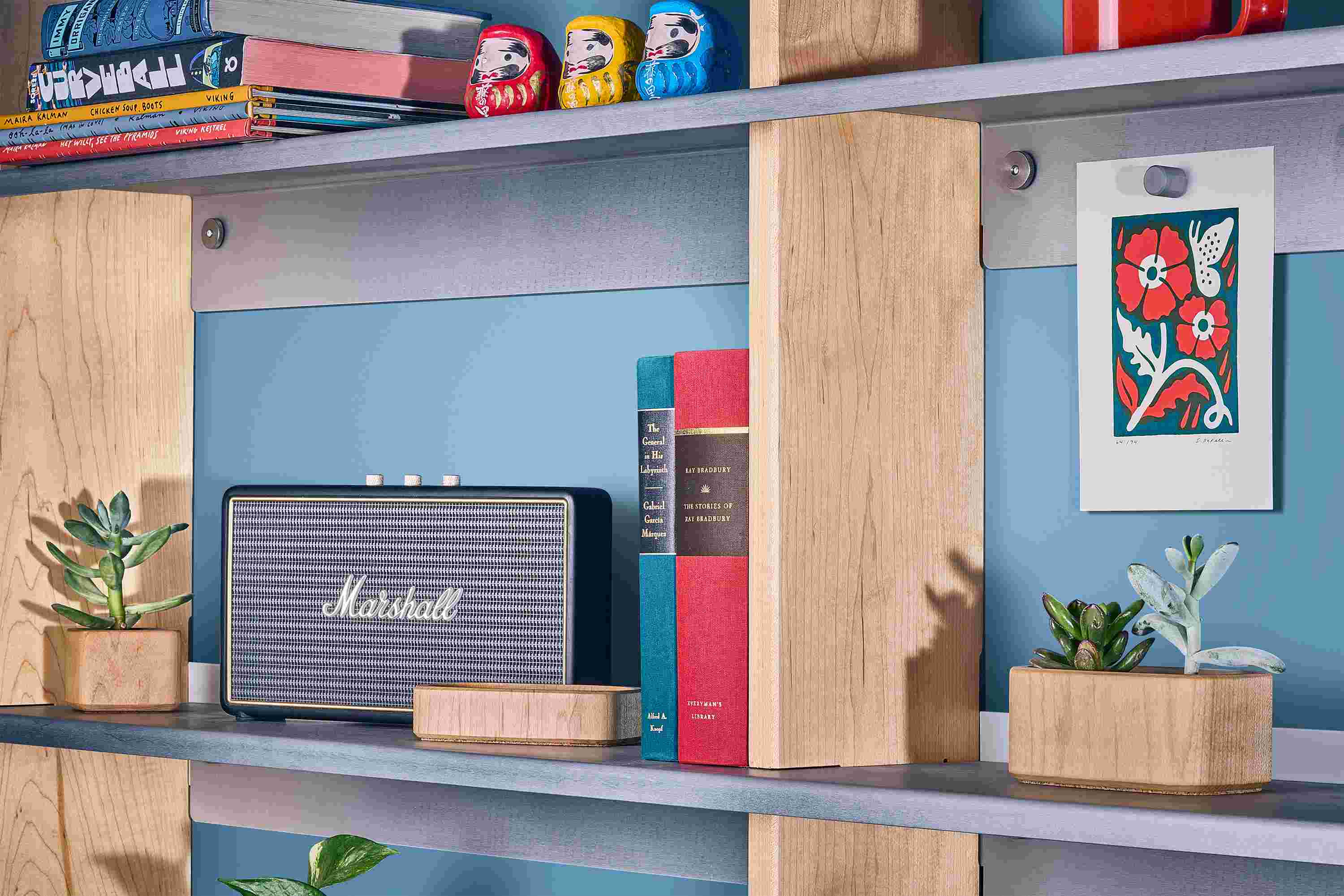 Detail of the wood and metal textures of the Grovemade maple wall shelf.