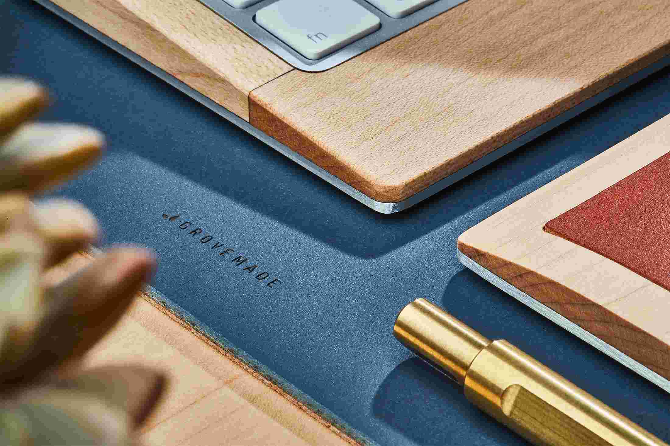 Close up detail showing the surface texture of the natural linoleum in blue and layered cork base for extra cushion.