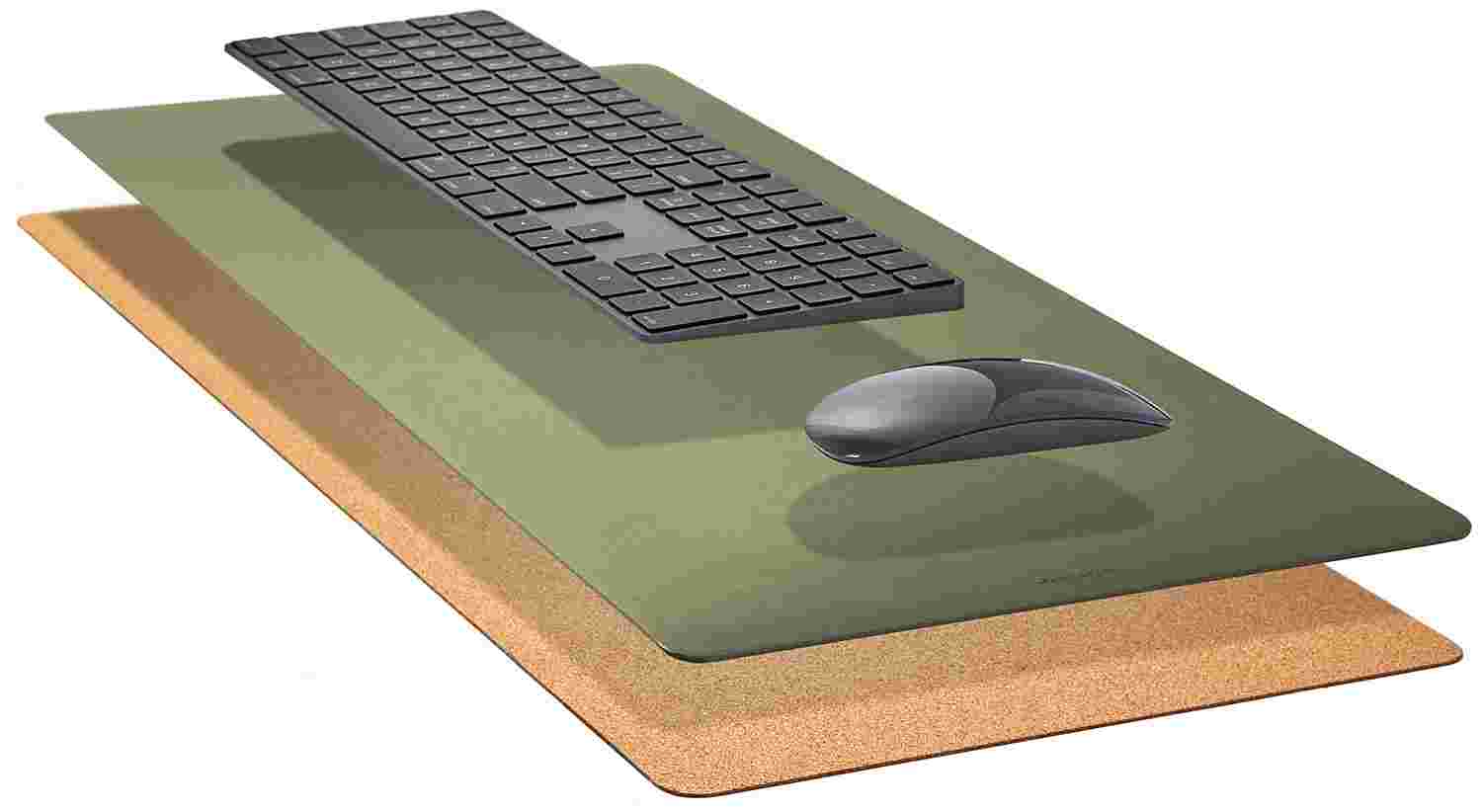 Exploded, cross-section view of the Matte Desk Pad in Dark Green, showing the layering of cork and all-natural linoleum.