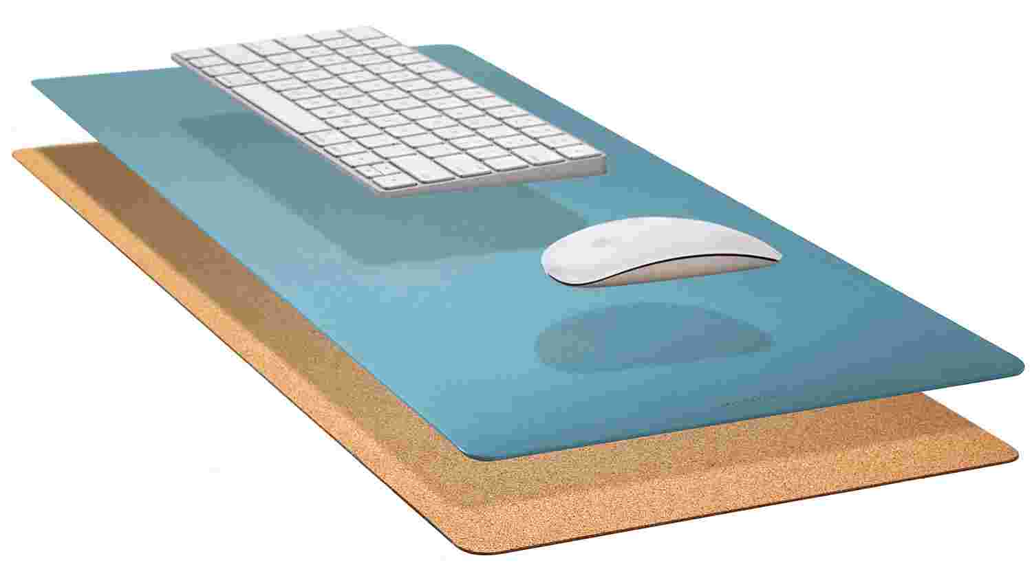 Exploded, cross-section view of the Matte Desk Pad in Light Blue, showing the layering of cork and all-natural linoleum.