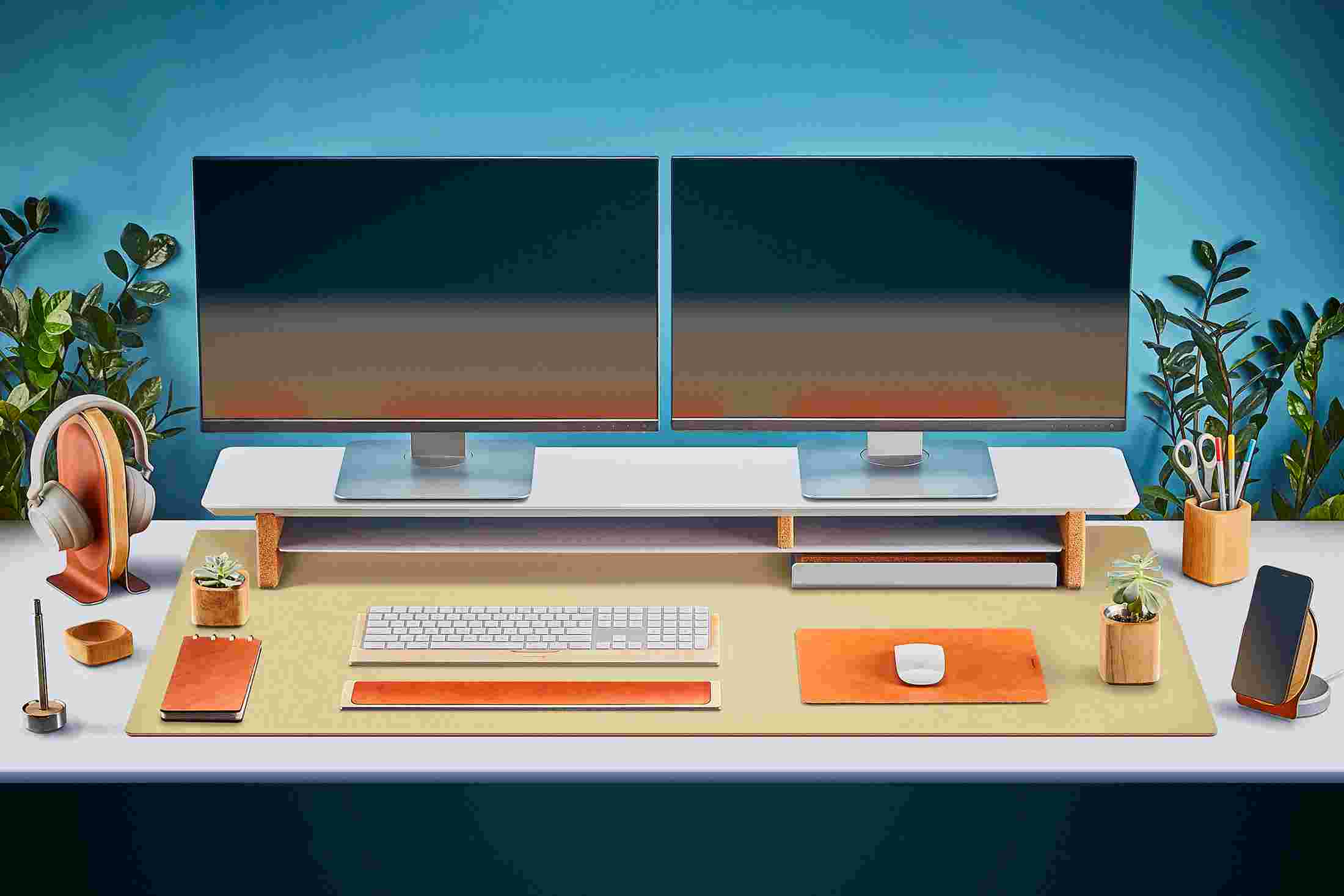The Extra Large Matte Desk Pad in Light Yellow covering almost an entire desktop, in use with the Matte White Desk Shelf System.