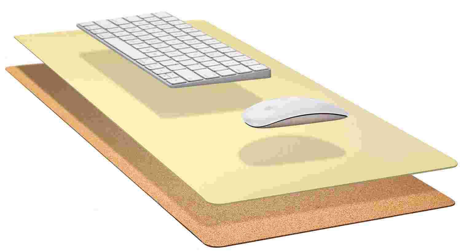 Exploded, cross-section view of the Matte Desk Pad in Light Yellow, showing the layering of cork and all-natural linoleum.