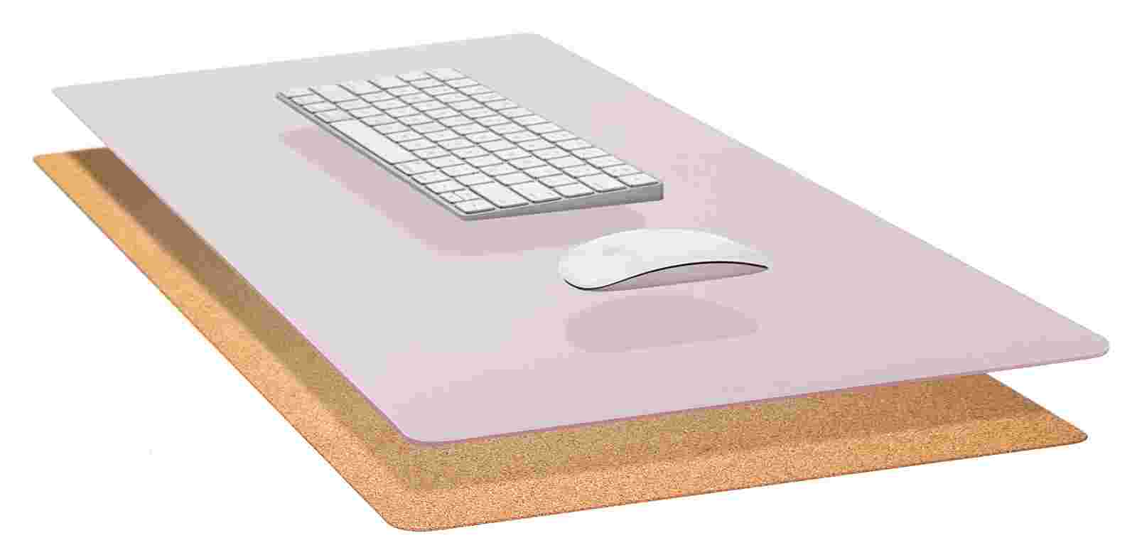 Exploded, cross-section view of the Matte Desk Pad in Light Yellow, showing the layering of cork and all-natural linoleum.
