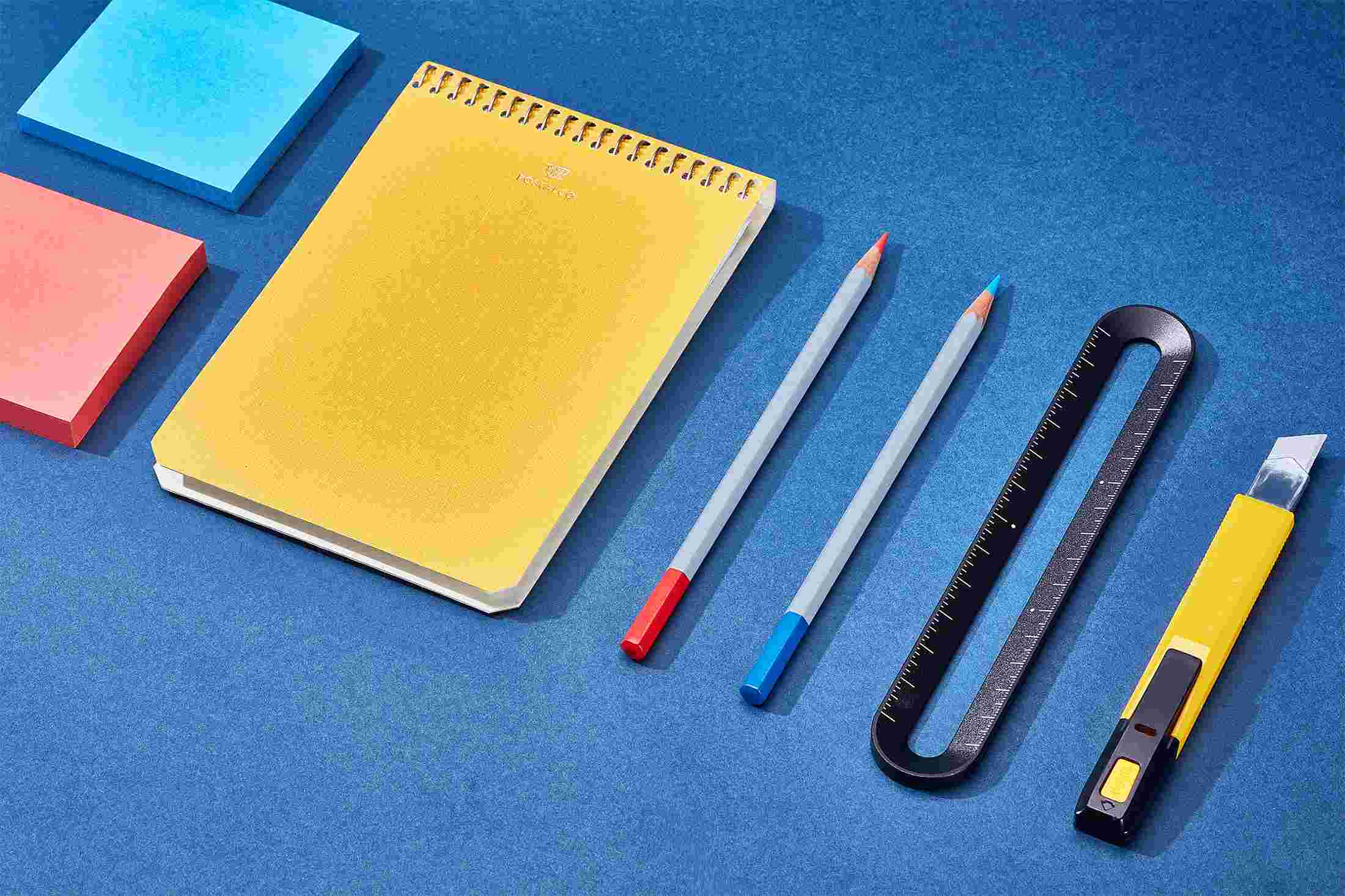 The Grovemade 6-Inch Ruler on blue paper with crafting tools.