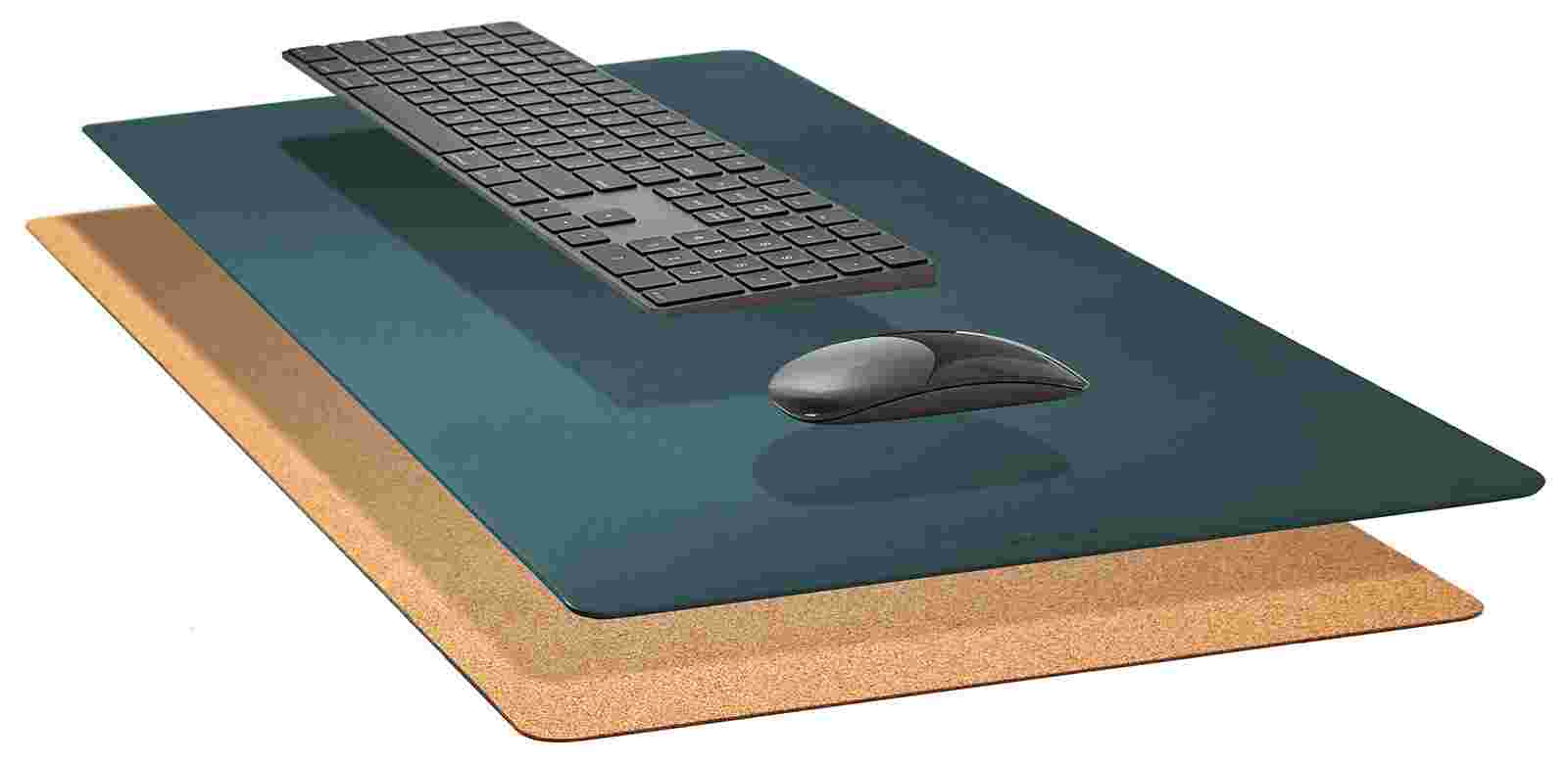 Exploded, cross-section view of the Conifer Green Desk Pad showing the layering of cork and all-natural linoleum.