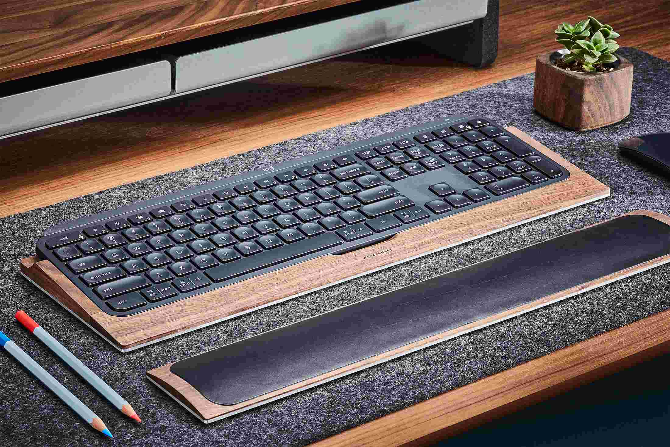 The Walnut MX Keys Tray with matching wood and leather wrist rest. 