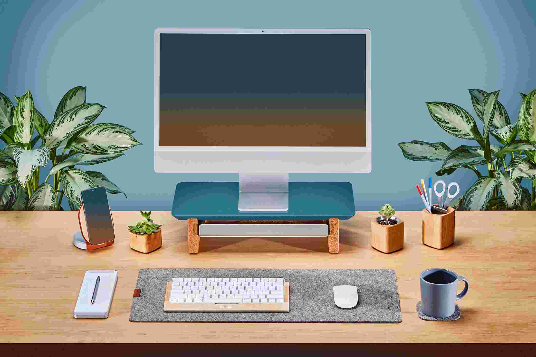 Small Navy Blue Desk Shelf shown with 24 inch Apple iMac.