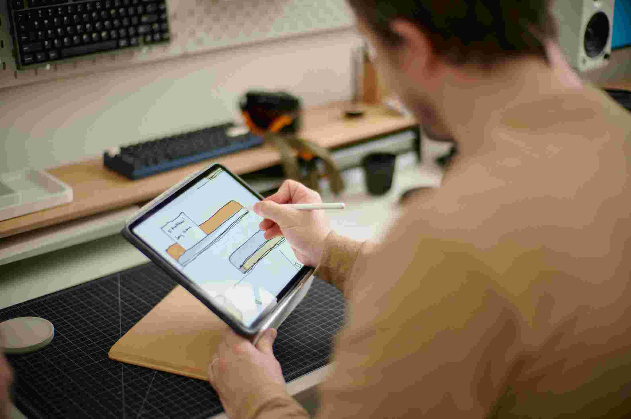 Sean sketches the Display Rail on an iPad.