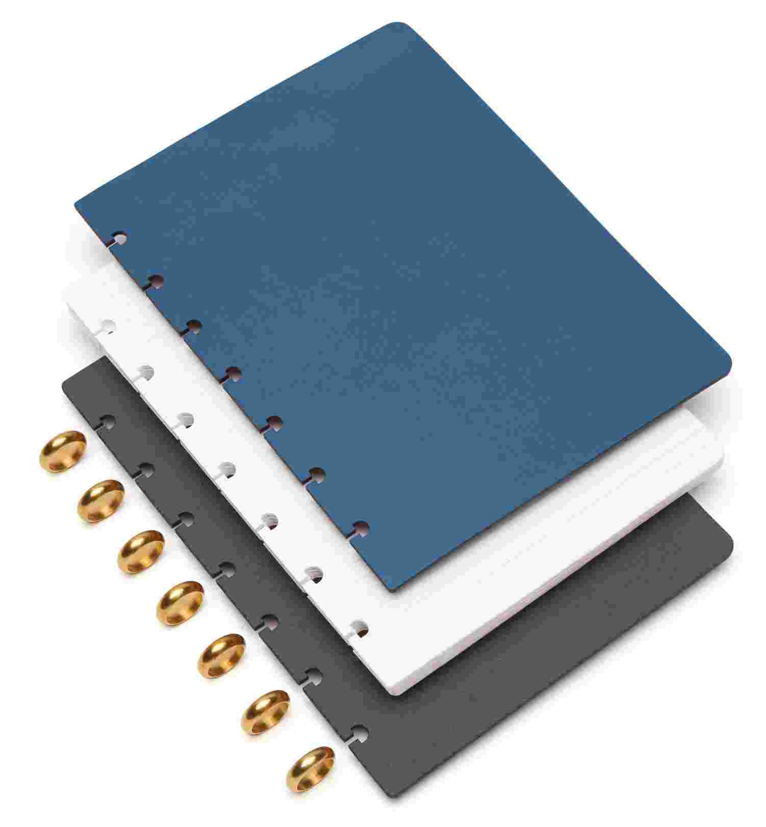 Exploded, cross-section view of the Matte Desk Pad in Navy Blue, showing the layering of cork and all-natural linoleum.