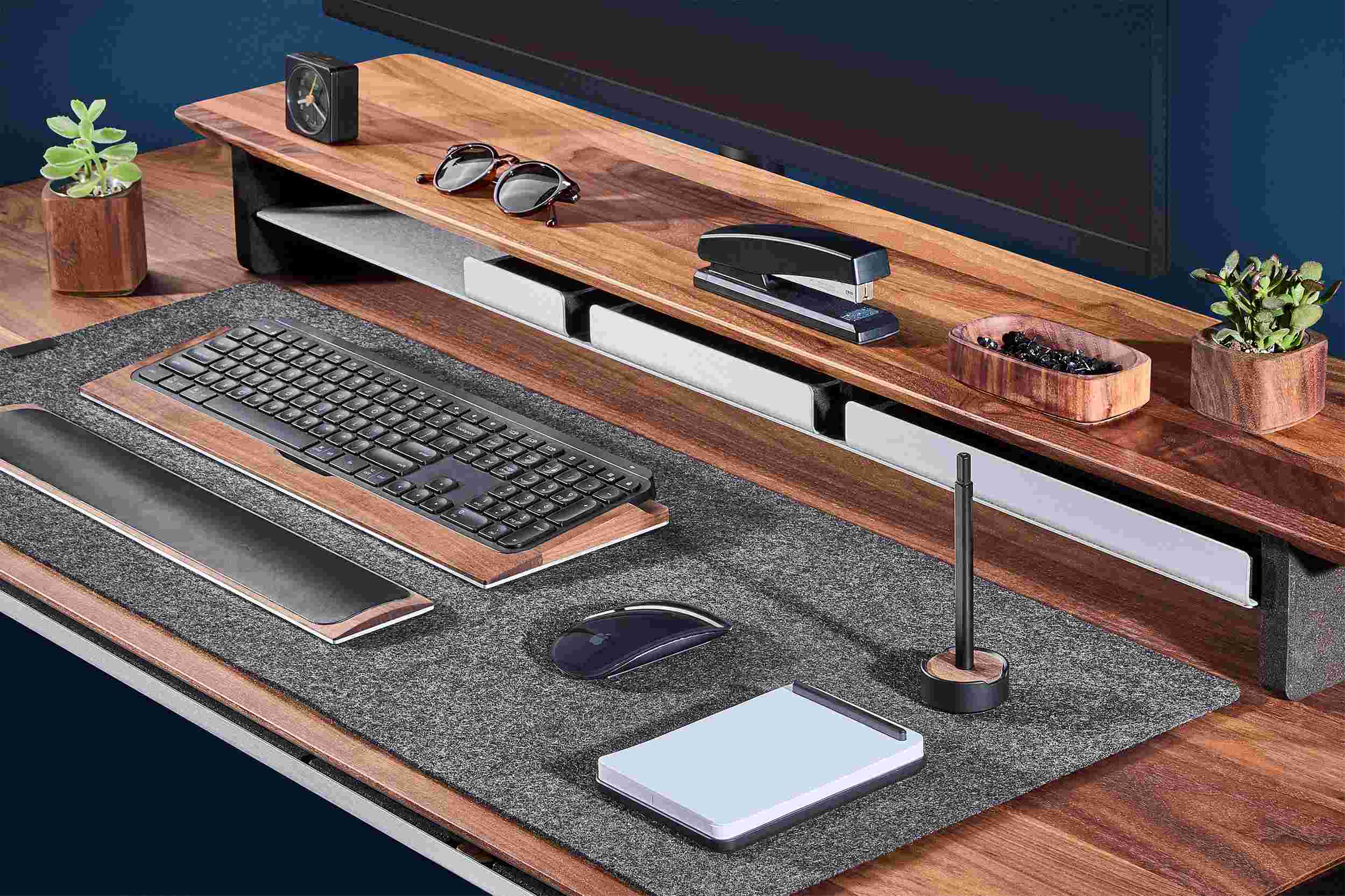 Small black notepad on the Grovemade Walnut Desk.