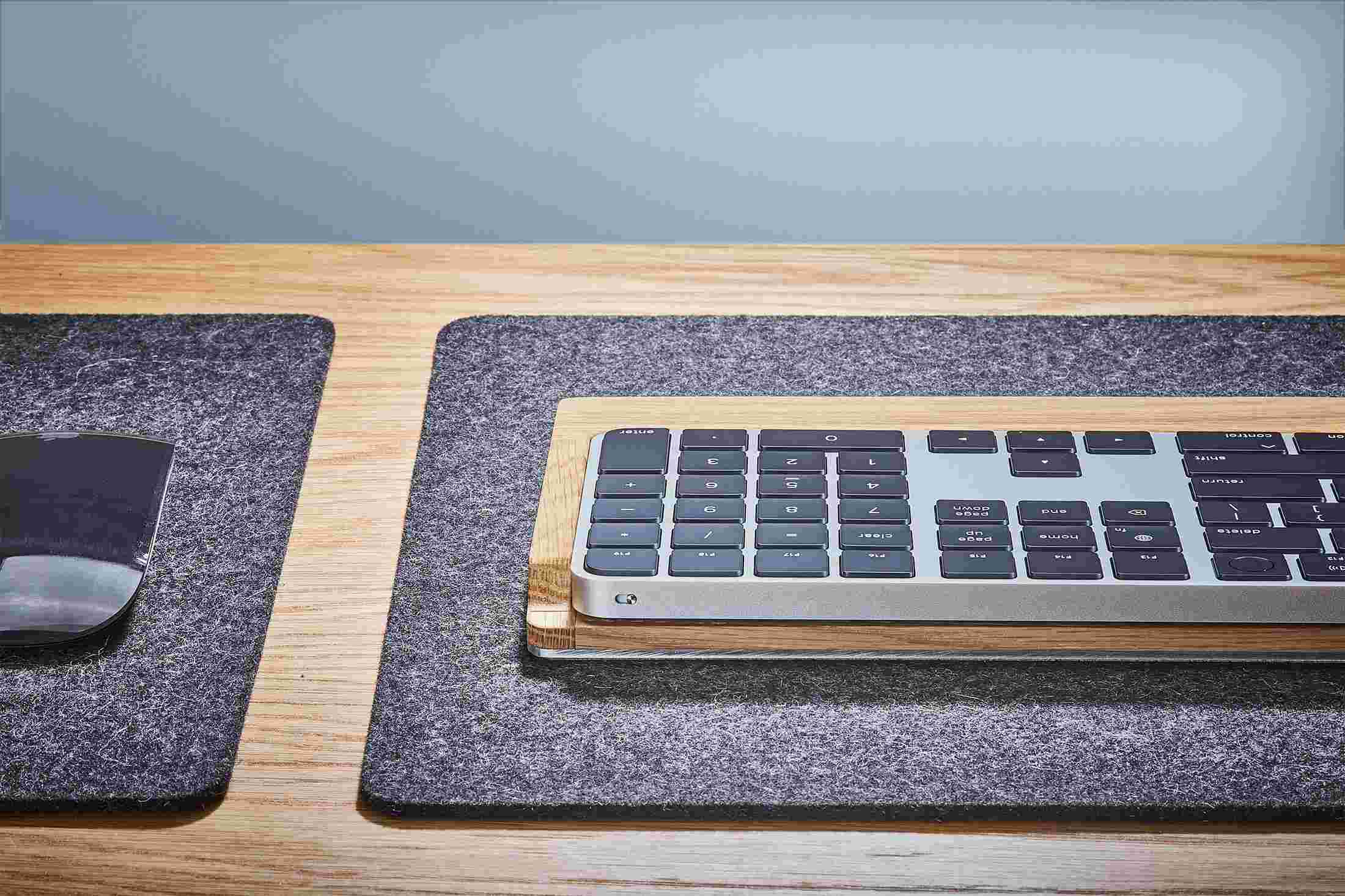 The back of the Oak Apple Keyboard Tray, open for access to the charging port.