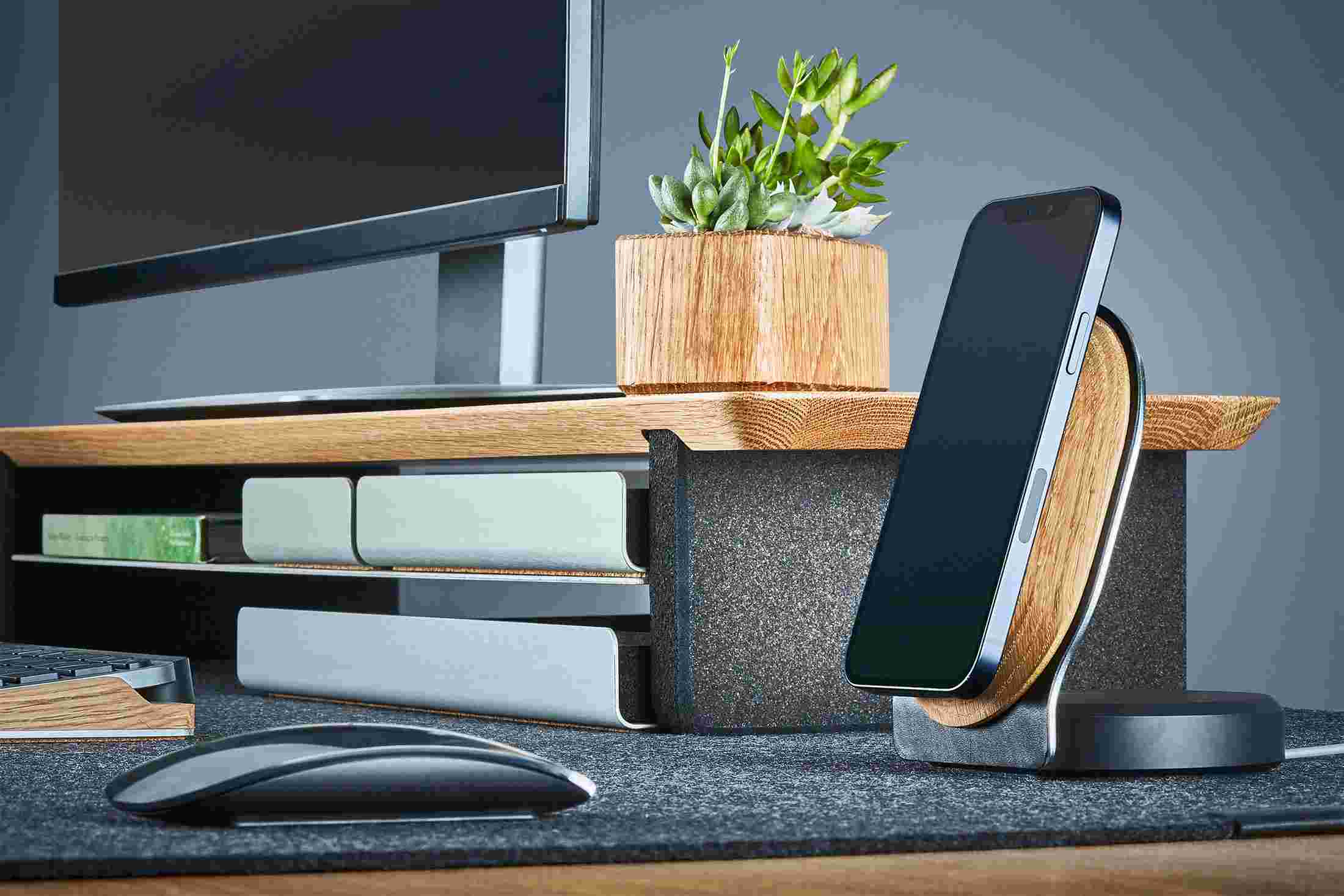 Solid Oak MagSafe charging stand for iPhone 15.