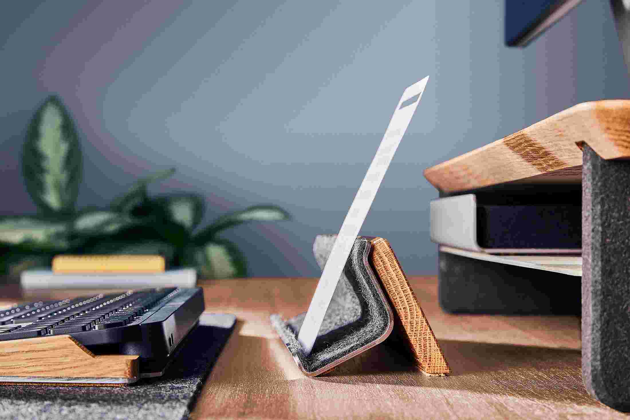 Profile view of the Oak Display Rail with custom note card.