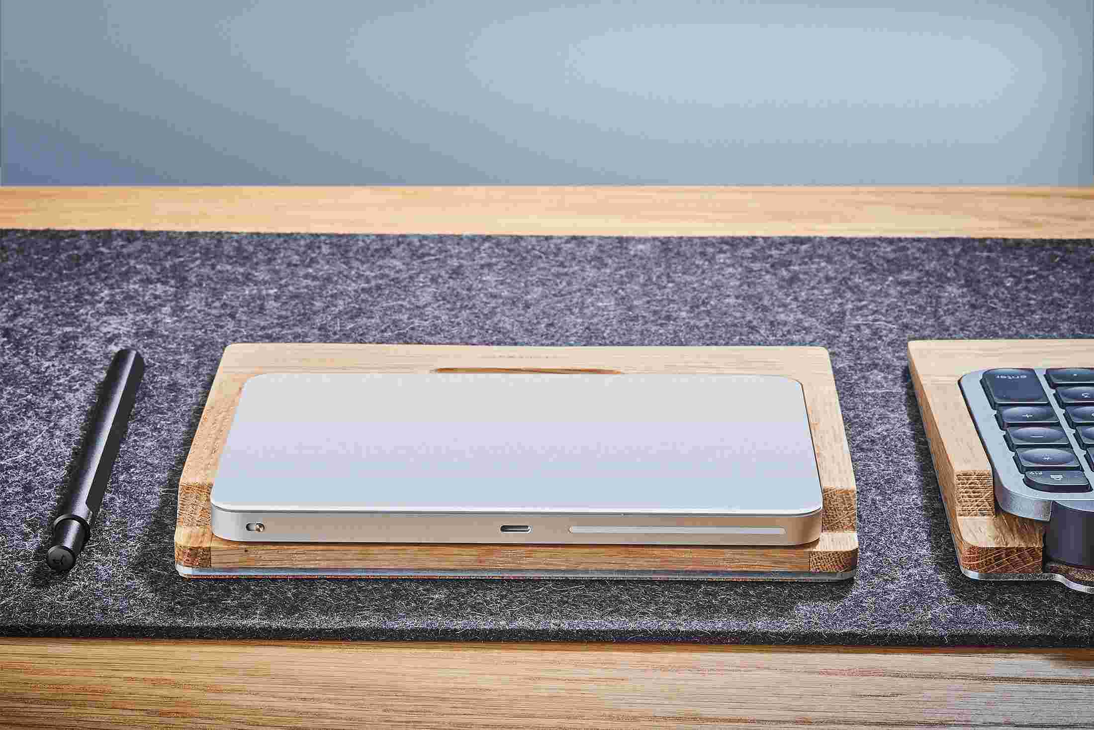 Rear view detail of the steel and oak wood trackpad tray.