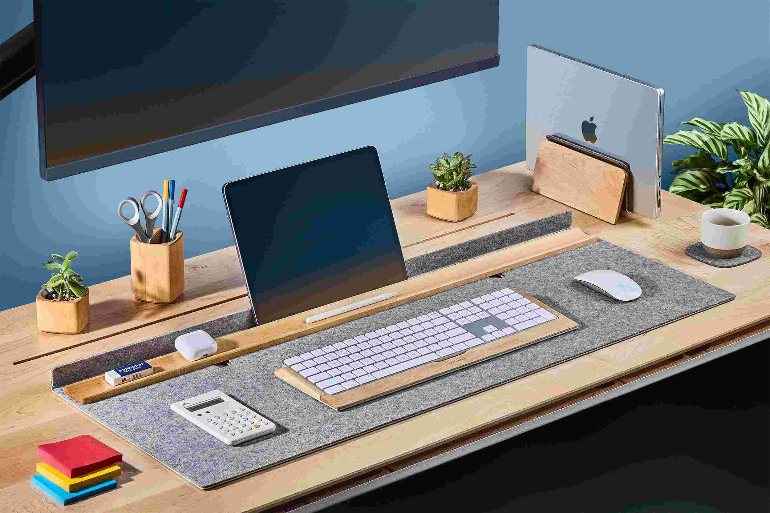 Wool and maple desk station with matching wood keyboard tray and MacBook stand.