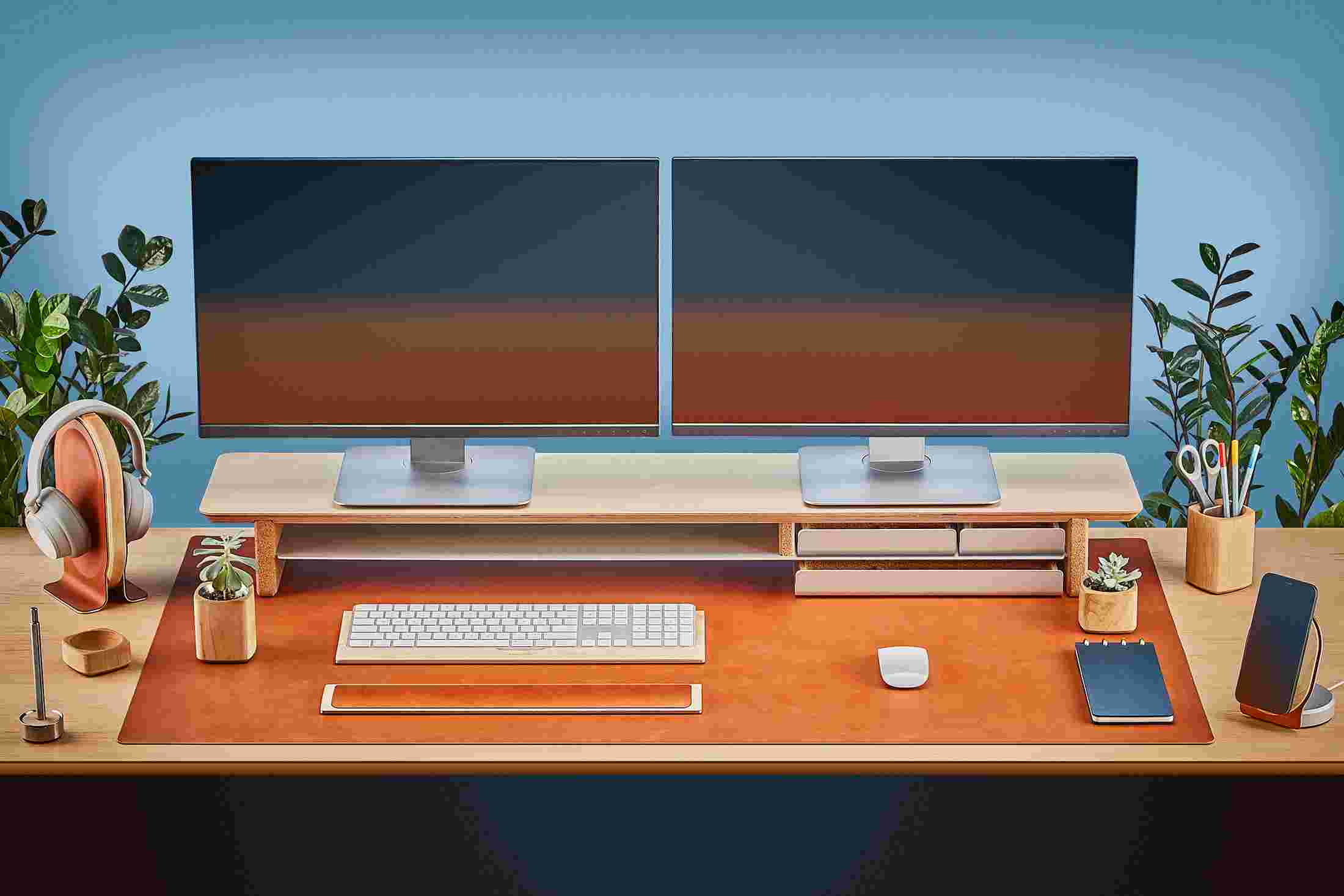 The Extra Large Felt Desk Pad covering almost an entire desktop, in use with the Maple Desk Shelf System.