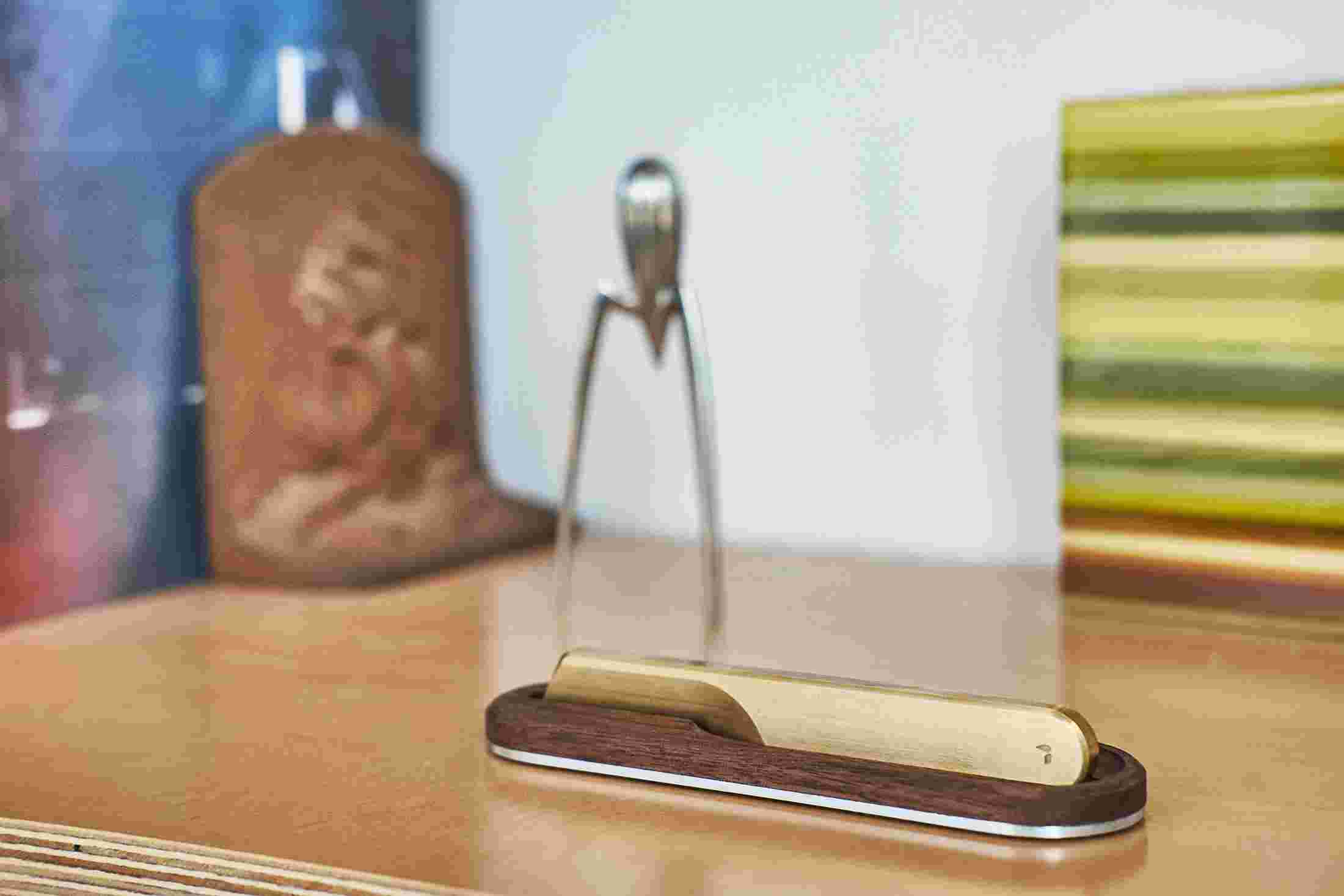 The Grovemade Brass Task Knife with walnut stand.