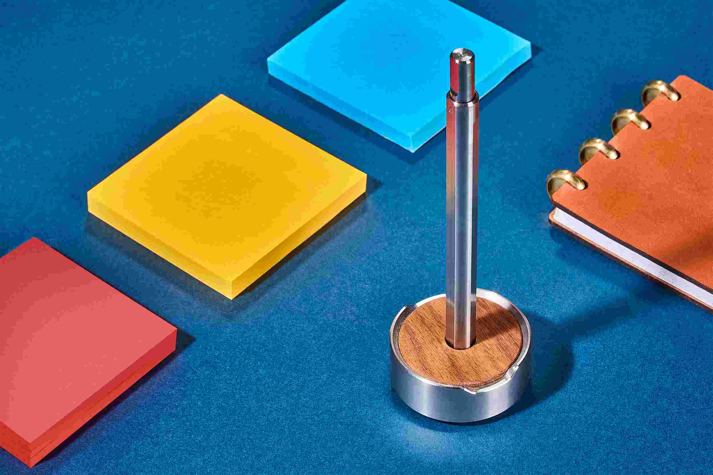 The Grovemade Titanium Pen and Walnut Pen Stand among the rest of the Grovemade Desk Collection.