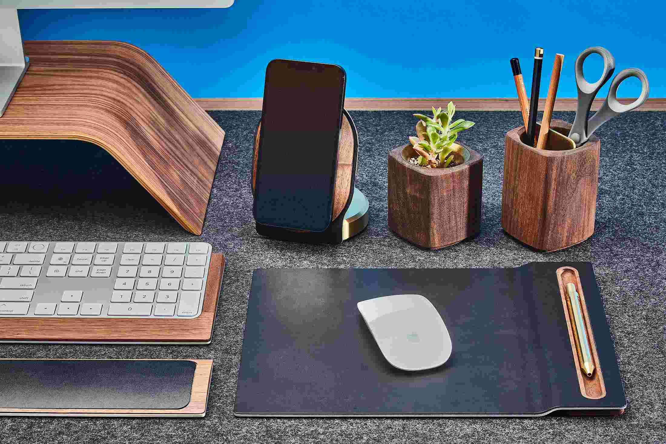 Detail of the walnut and leather mouse pad with cork base.