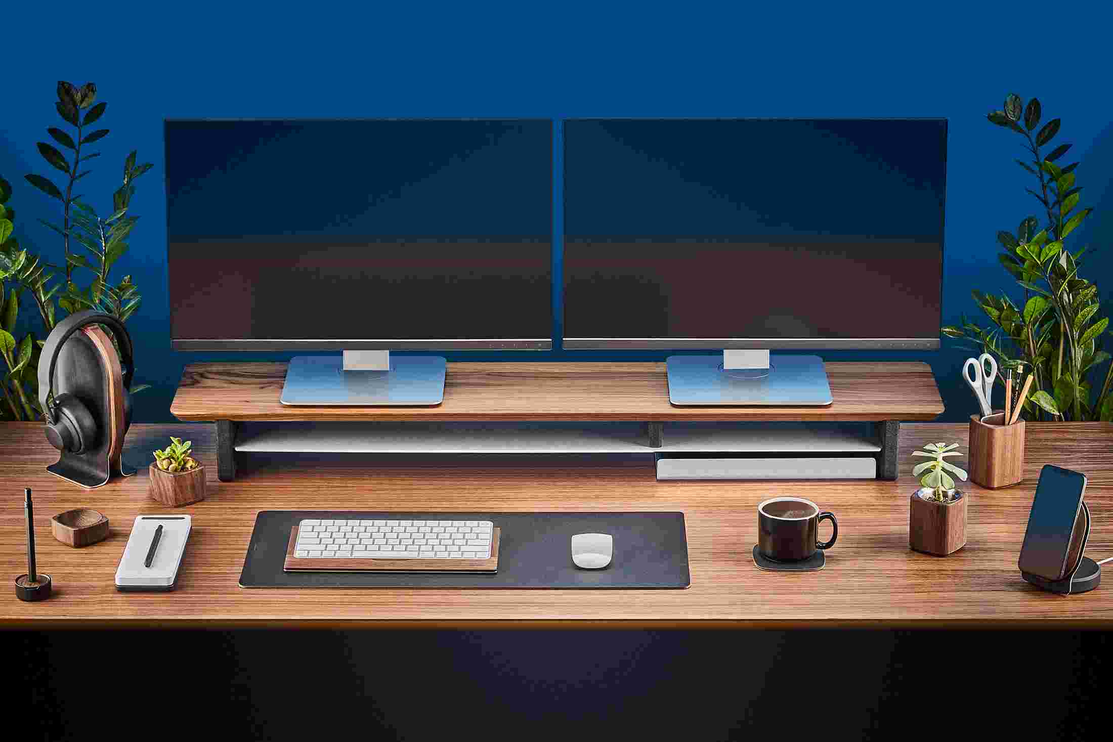 The small matte black desk pad slides easily under the desk shelf.