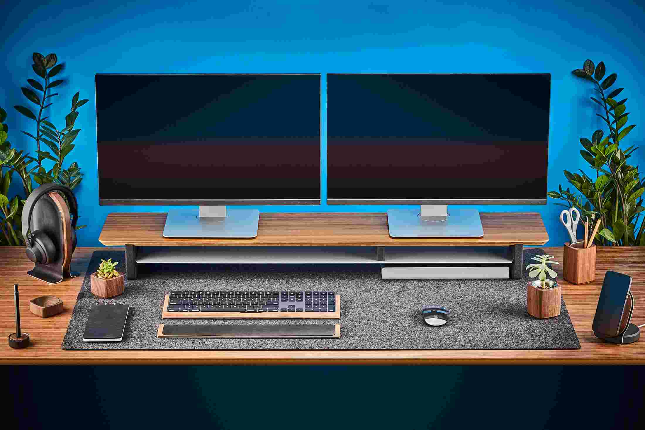 The Extra Large Felt Desk Pad supporting the entire Walnut Desk Shelf System.