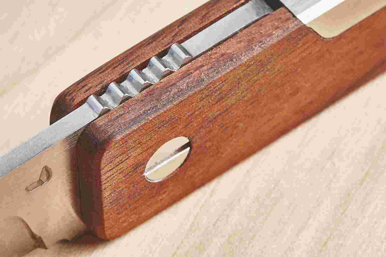 Detail of the grooved back side of the Grovemade Walnut Pocket Knife.