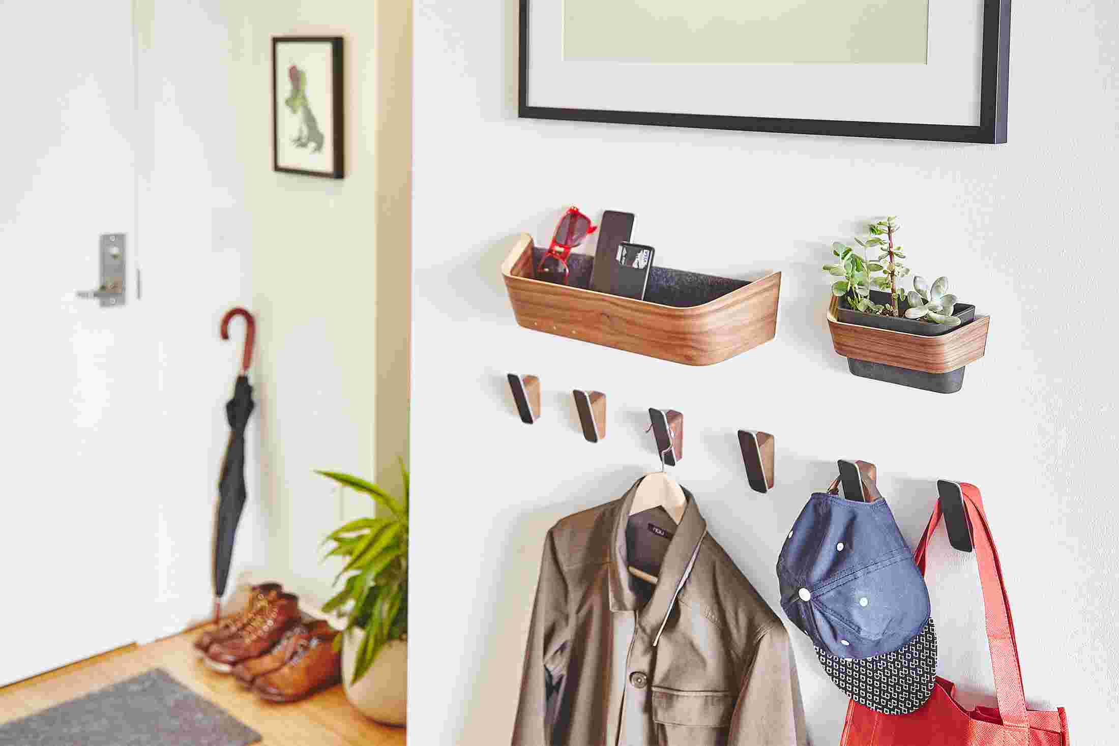 Entryway with six Grovemade Walnut Wall Hooks.