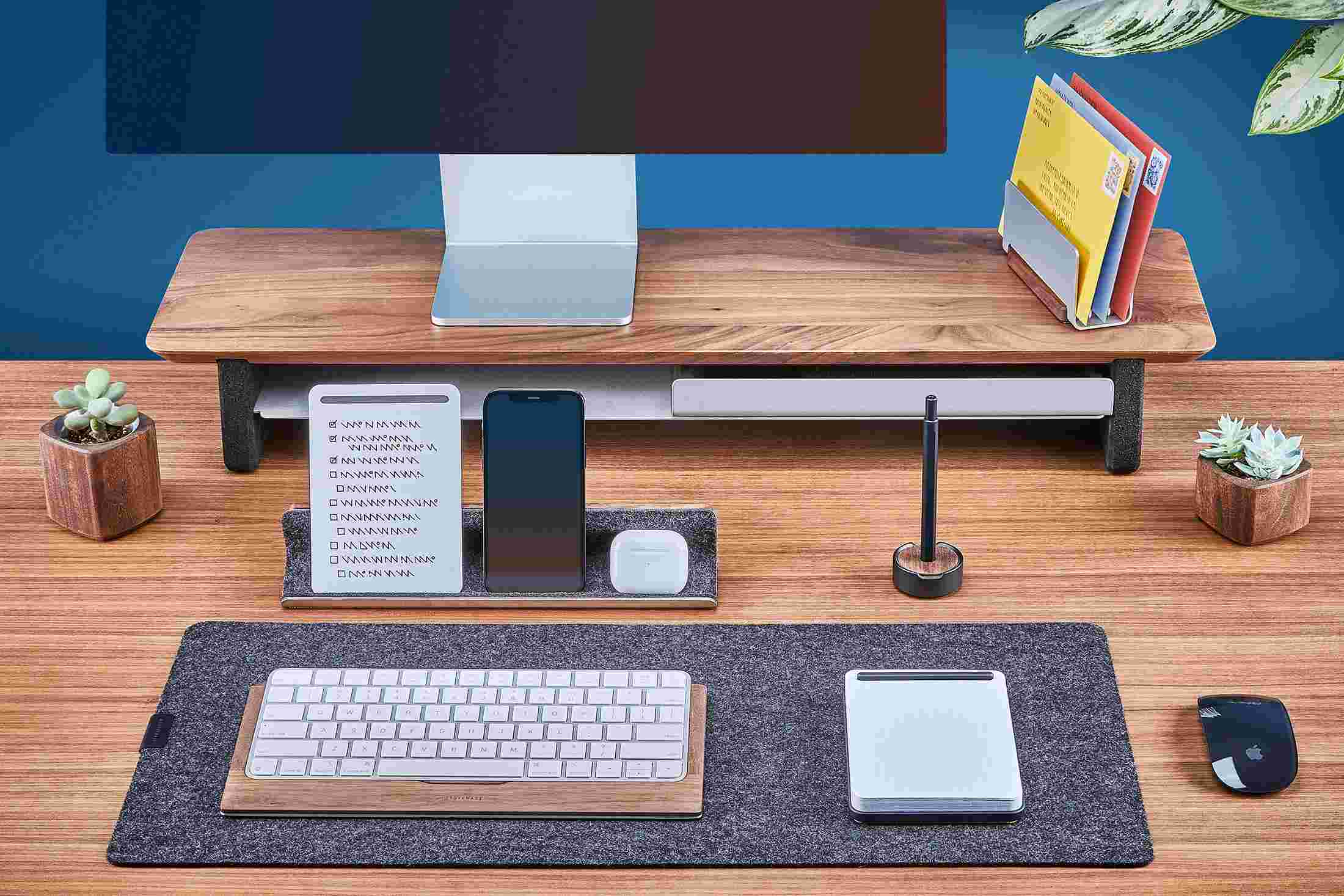 The Walnut Note-Taking kit, with notepad for jotting ideas, display rail for processing notes and holding your phone, and vertical organizer for filing and archiving notes and mail.