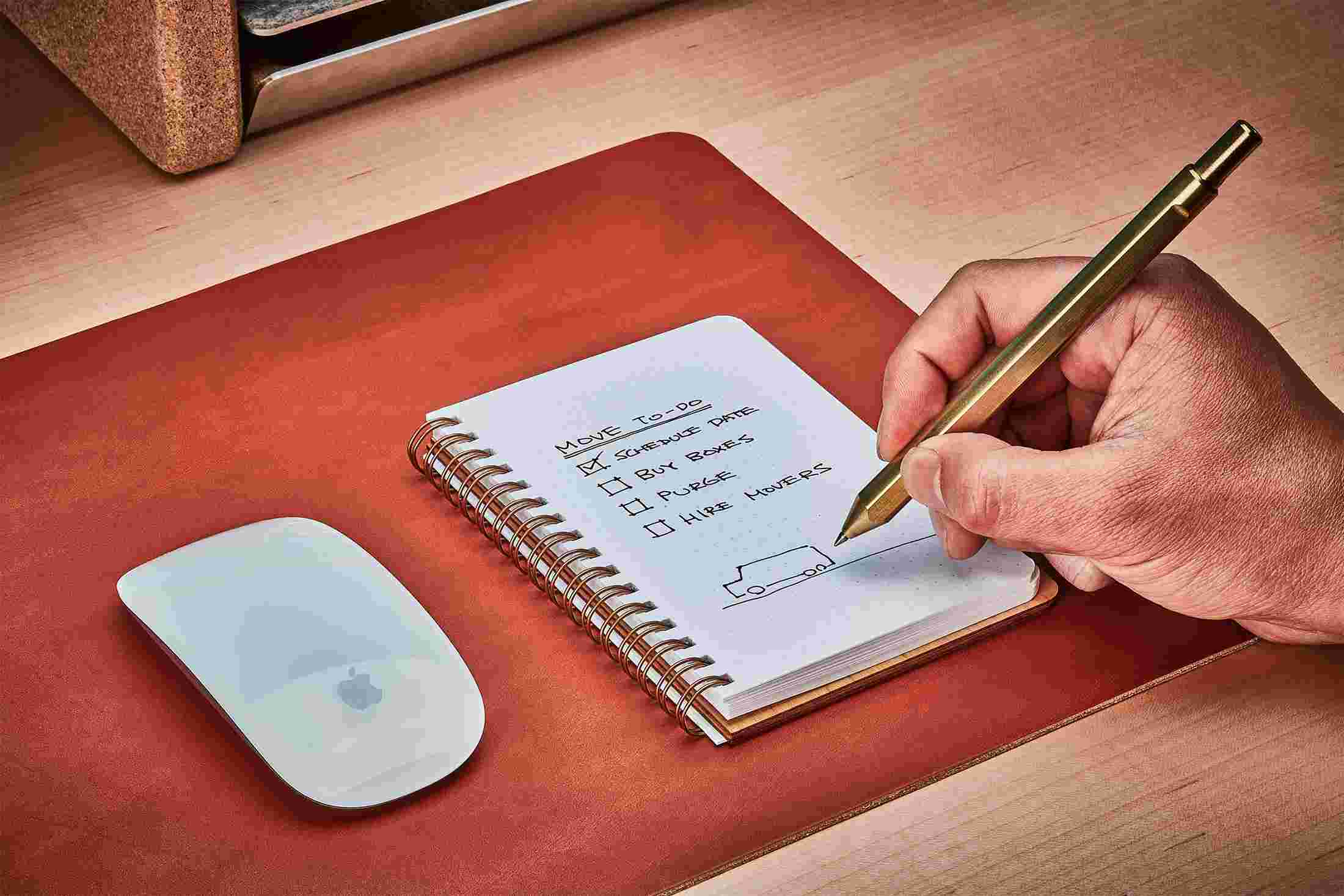The maple notebook with cover folded back flat for easy writing.
