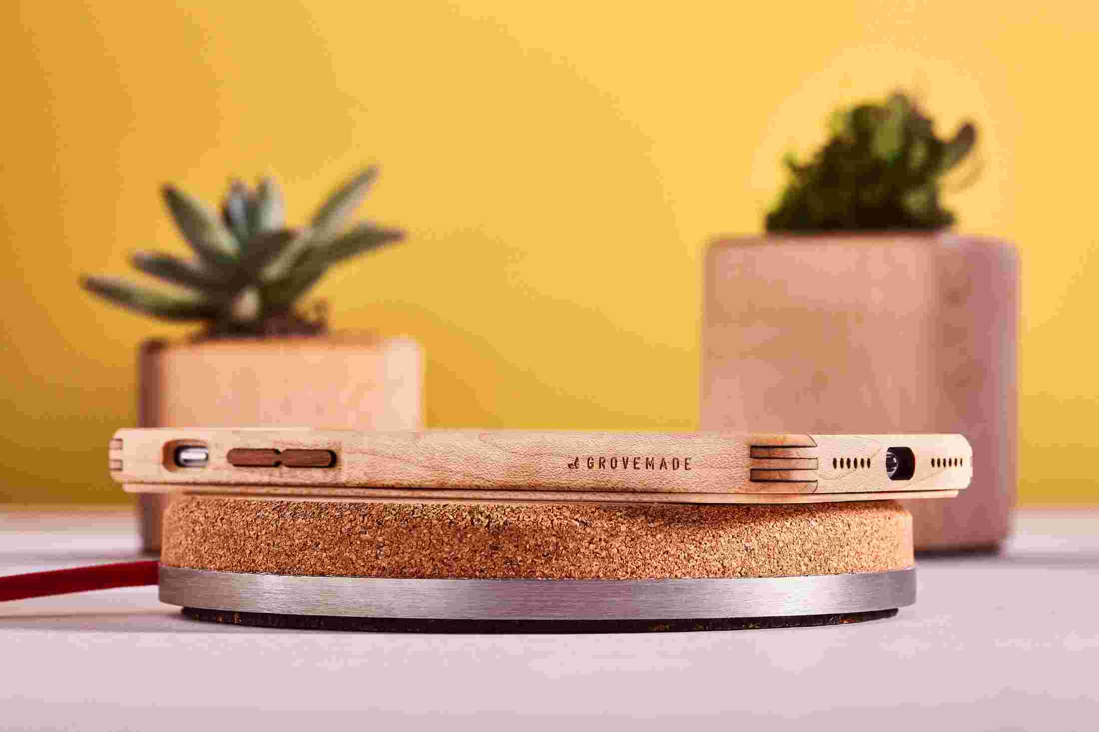 Profile view showing the natural cork and stainless steel base of the Wireless Charging Pad for iPhone XR.