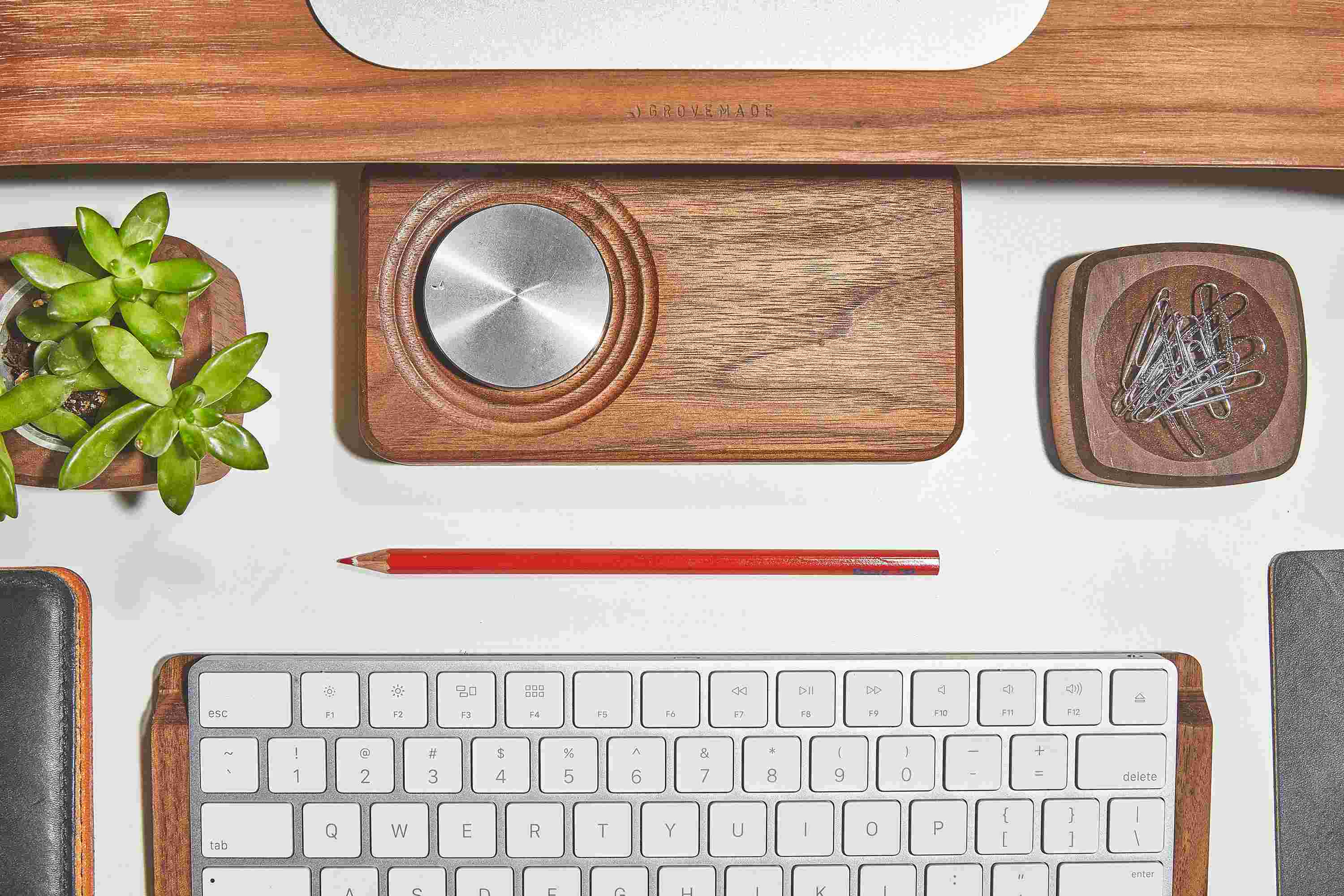 Top view of the walnut wood amplifier, part of the Grovemade wood desk collection.